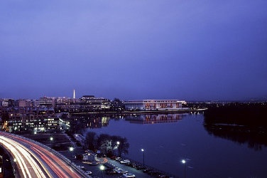 Landscape at sundown. View of Potomac river. The Kennedy Center stands next to the river