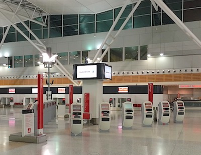 Row of airline kiosks at an airport