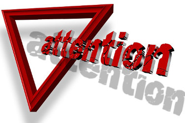 Red triangle on white background. From the triangle comes out the word attention in red letters